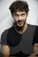  Young Man wearing a dark T-Shirt