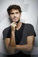  Young Man wearing a dark T-Shirt