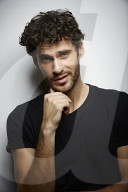  Young Man wearing a dark T-Shirt