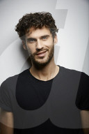  Young Man wearing a dark T-Shirt