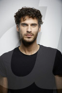  Young Man wearing a dark T-Shirt