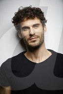  Young Man wearing a dark T-Shirt