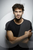  Young Man wearing a dark T-Shirt