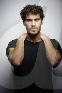  Young Man wearing a dark T-Shirt