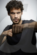  Young Man wearing a dark T-Shirt