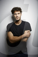  Young Man wearing a dark T-Shirt