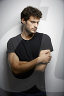  Young Man wearing a dark T-Shirt