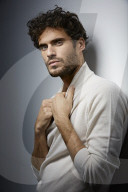 Young Man wearing a white Turtleneck