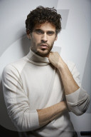 Young Man wearing a white Turtleneck