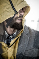 Portrait of a Man wearing a hooded Jacket