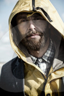 Portrait of a Men with hooded jacket