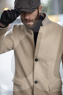 Man wearing Coat and Flat Cap