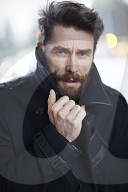Man wearing a black Winter Coat