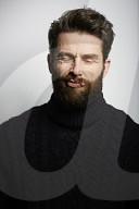  Portrait of a Man wearing a black Turtleneck
