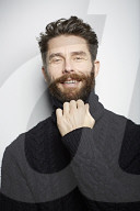  Portrait of a Man wearing a black Turtleneck