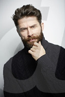  Portrait of a Man wearing a black Turtleneck