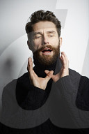  Portrait of a Man wearing a black Turtleneck