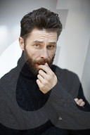  Portrait of a Man wearing a black Turtleneck