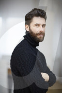  Portrait of a Man wearing a black Turtleneck