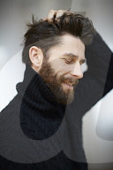  Portrait of a Man wearing a black Turtleneck
