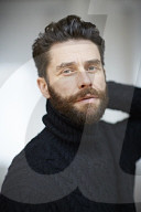  Portrait of a Man wearing a black Turtleneck