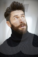  Portrait of a Man wearing a black Turtleneck