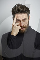  Portrait of a Man wearing a black Turtleneck