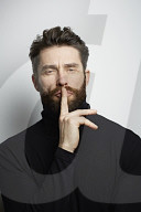  Portrait of a Man wearing a black Turtleneck