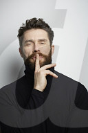  Portrait of a Man wearing a black Turtleneck