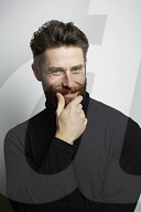  Portrait of a Man wearing a black Turtleneck