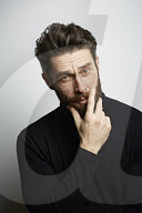  Portrait of a Man wearing a black Turtleneck