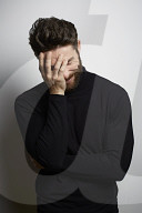  Portrait of a Man wearing a black Turtleneck