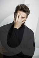 Portrait of a Man wearing a black Turtleneck