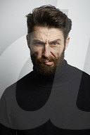  Portrait of a Man wearing a black Turtleneck