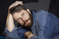  Man with Full Beard wearing a Denim Jacket