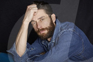  Man with Full Beard wearing a Denim Jacket