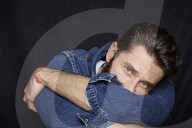  Man with Full Beard wearing a Denim Jacket