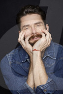  Man with Full Beard wearing a Denim Jacket