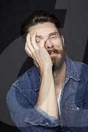  Man with Full Beard wearing a Denim Jacket