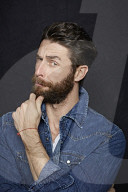  Man with Full Beard wearing a Denim Jacket