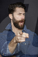 Man with Full Beard wearing a Denim Jacket