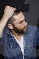 Man with Full Beard wearing a Denim Jacket