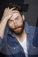  Man with Full Beard wearing a Denim Jacket