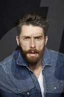  Man with Full Beard wearing a Denim Jacket