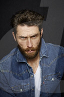  Man with Full Beard wearing a Denim Jacket