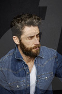  Man with Full Beard wearing a Denim Jacket