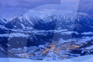 Illuminated valley in winter landscape