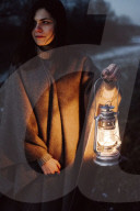 Woman holding an Oil Lamp
