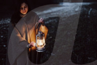 Woman holding an Oil Lamp