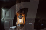 Wabi-Sabi Living Concept, Oil Lamp hanging on a Wooden Beam